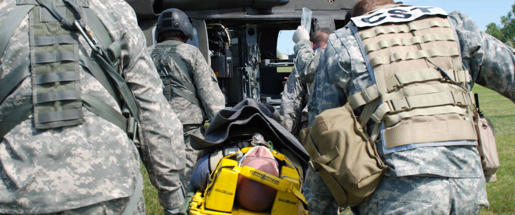 ||||Soldiers transporting a casualty on a stretcher|||